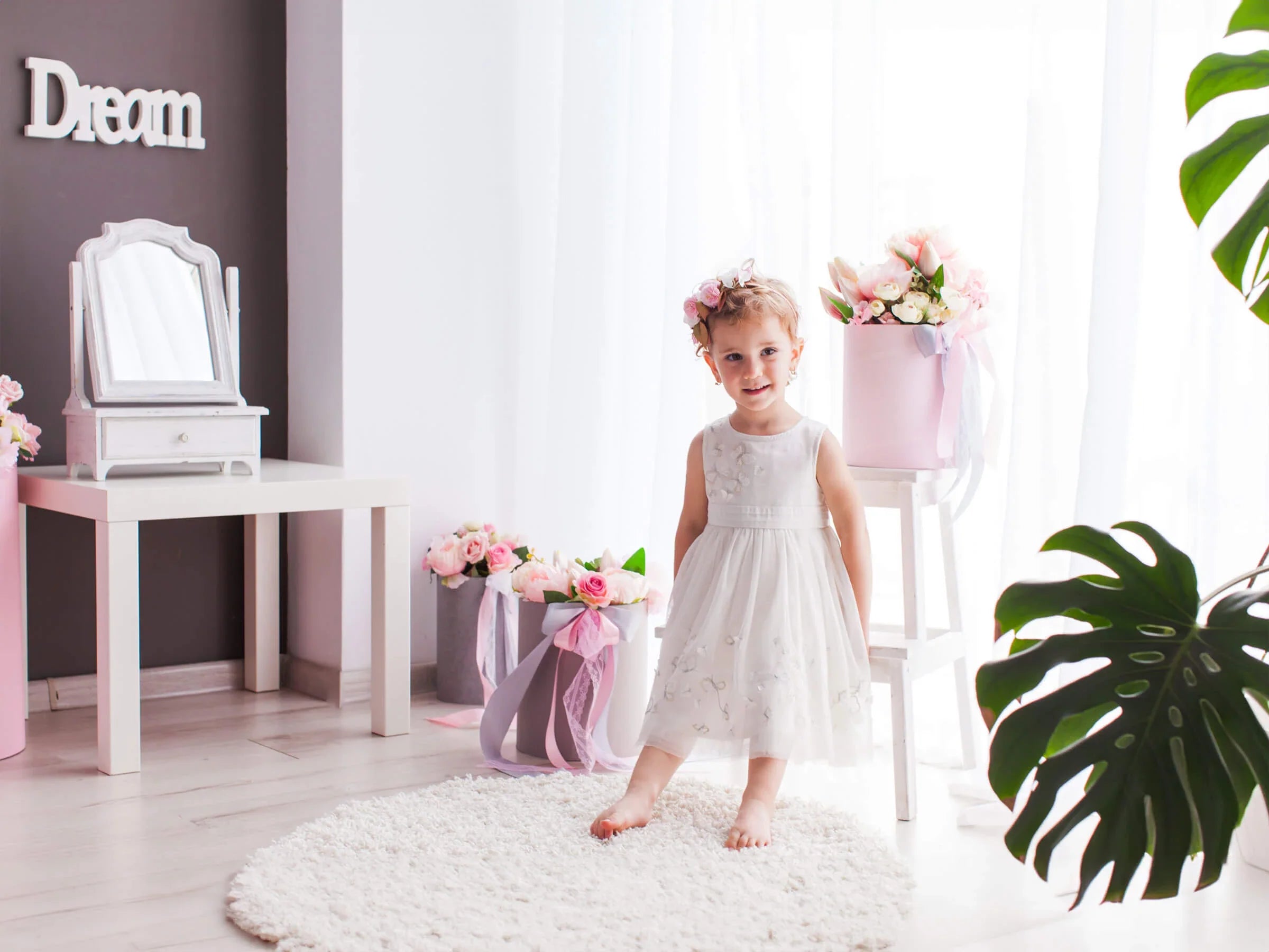 A girl wearing a vintage dress in a room