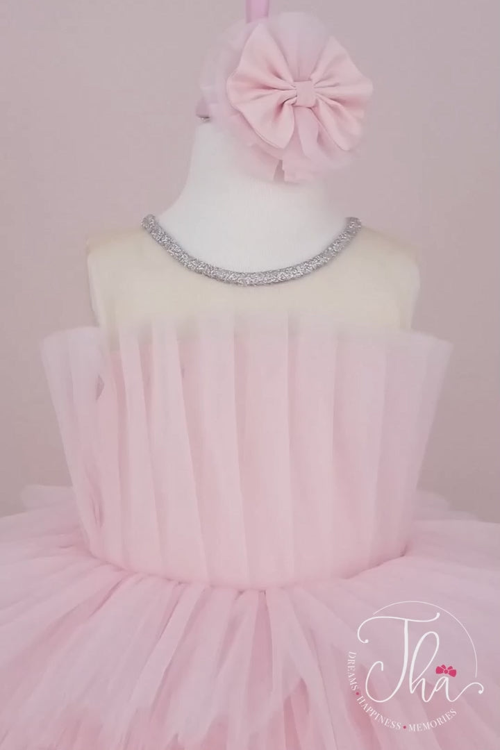 360° view of a pink special sleeveless queen dress that has illusion collar, glitter on collar, floor length tulle skirt, and tulle top
