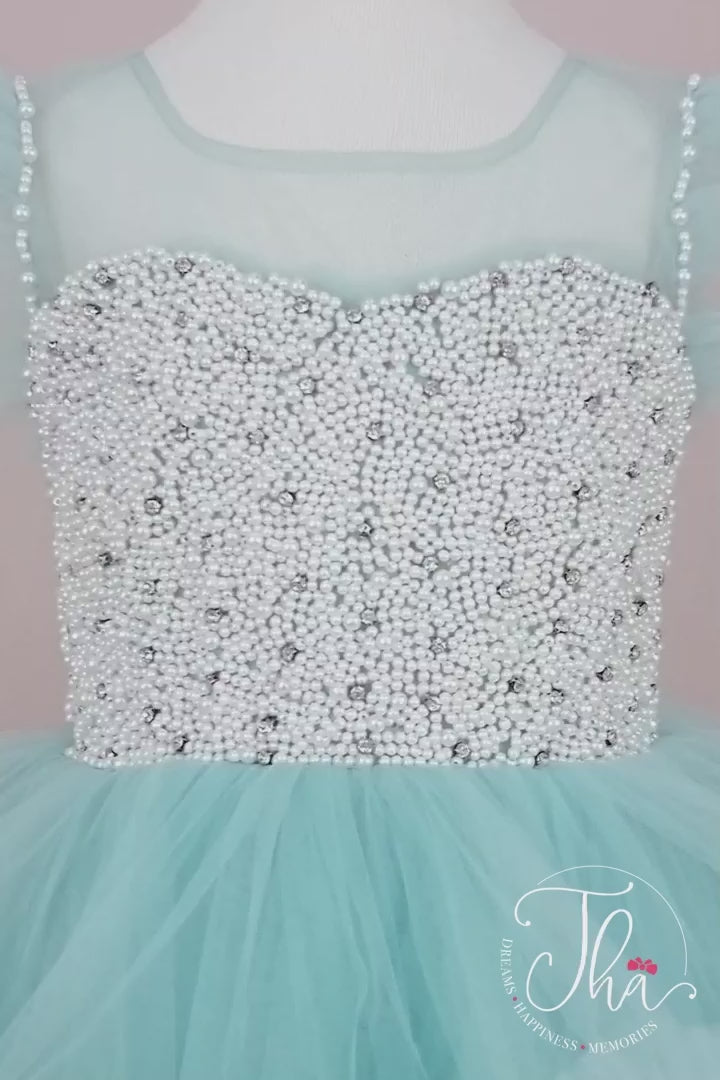360° view of a tiffany birthday outfit. The dress has ruffled tiffany skirt and pearl decorated embroidered on satin fabric top
