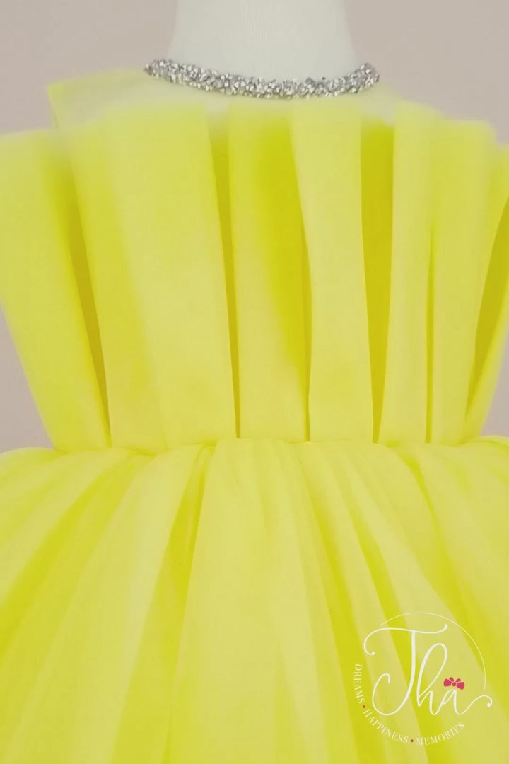 360° view of a yellow sleeveless sun fairy dress that has puffy skirt and illusion crystal stone decorated collar