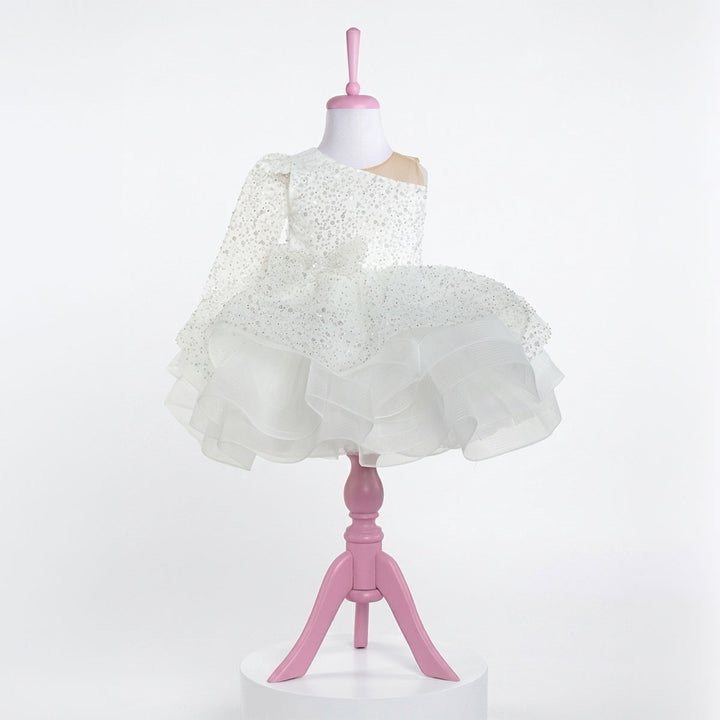 Monica white sequin tulle dress with one long sleeve and bow for toddler girls, front view