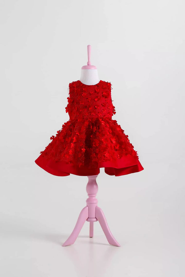 A red floral sleeveless Little Red Riding Hood dress that has 3D flowers and red puffy skirt